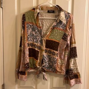 Long sleeve top. From shop impressions. Size large. New without tags.